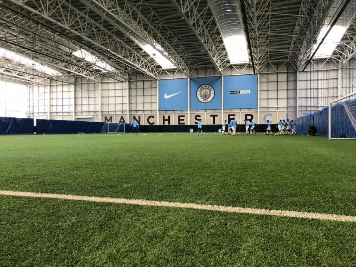 20 Kids From Around The World Had Fun Learning English And Football At Manchester City’s Etihad Campus 2 QNET