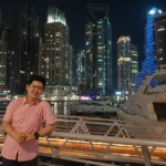 Michael Dovinno in front of city