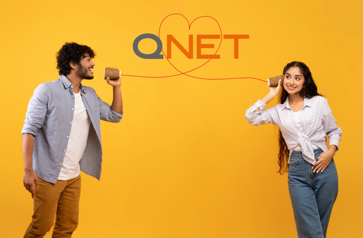 Youth direct selling industry entrepreneurs talking to each other with QNET is in a heart in the middle