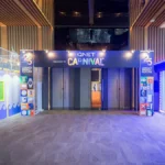 The vibrant entrance of the QNET Carnival, showcasing our commitment to sustainability at V-Convention 2023