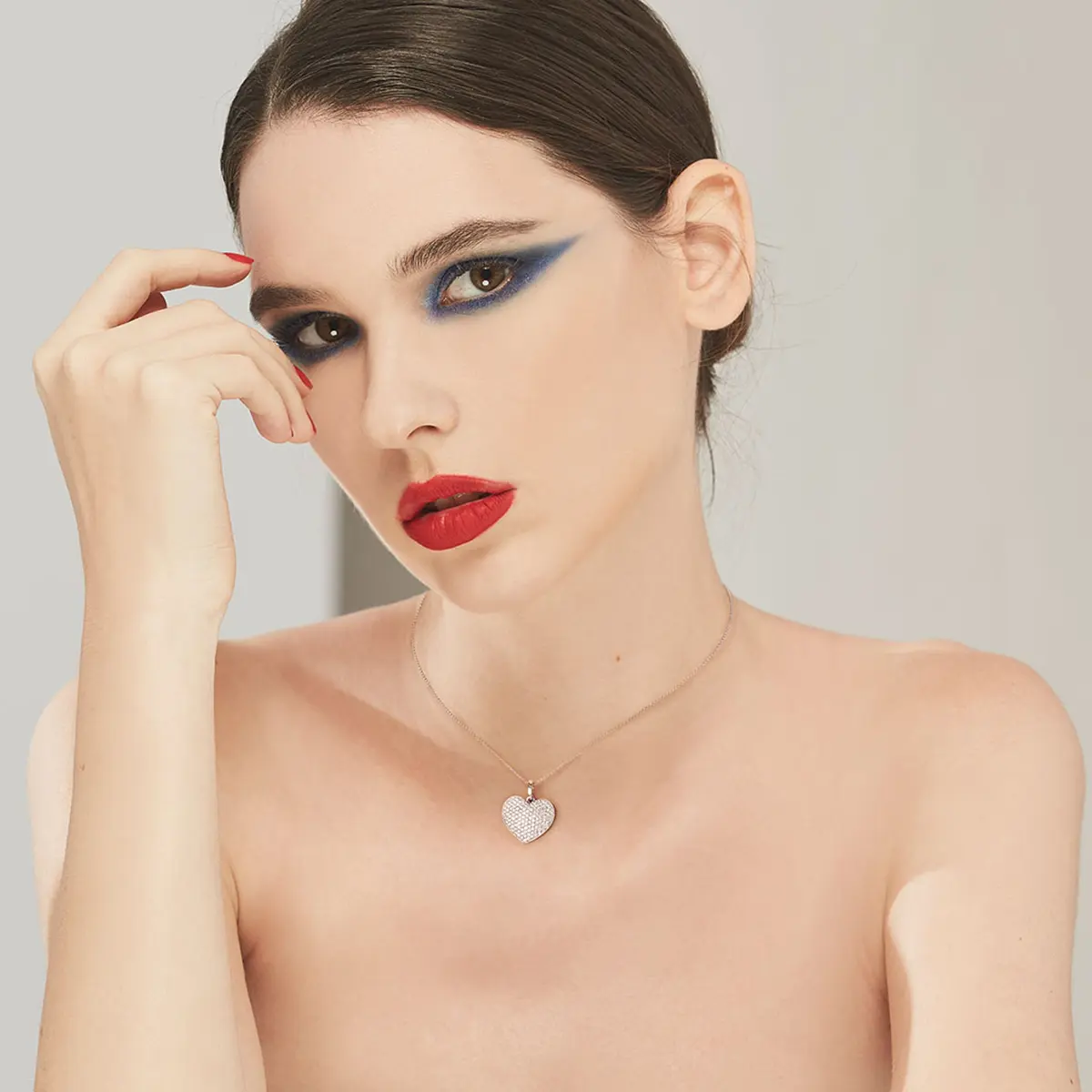 Woman wearing Bernhard H. Mayer Freya Pendant with 1.00 ct diamonds, H/SI