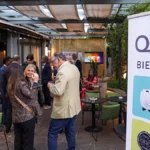 QNET South America banner welcomes guests to the soft launch in Argentina