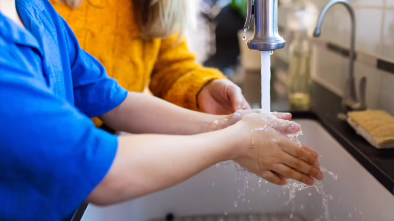 Why home water quality matters | Boy washing hands